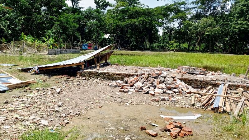 Photo shows rubbles of a demolished temple in Shariatpur on 6 August 2024.